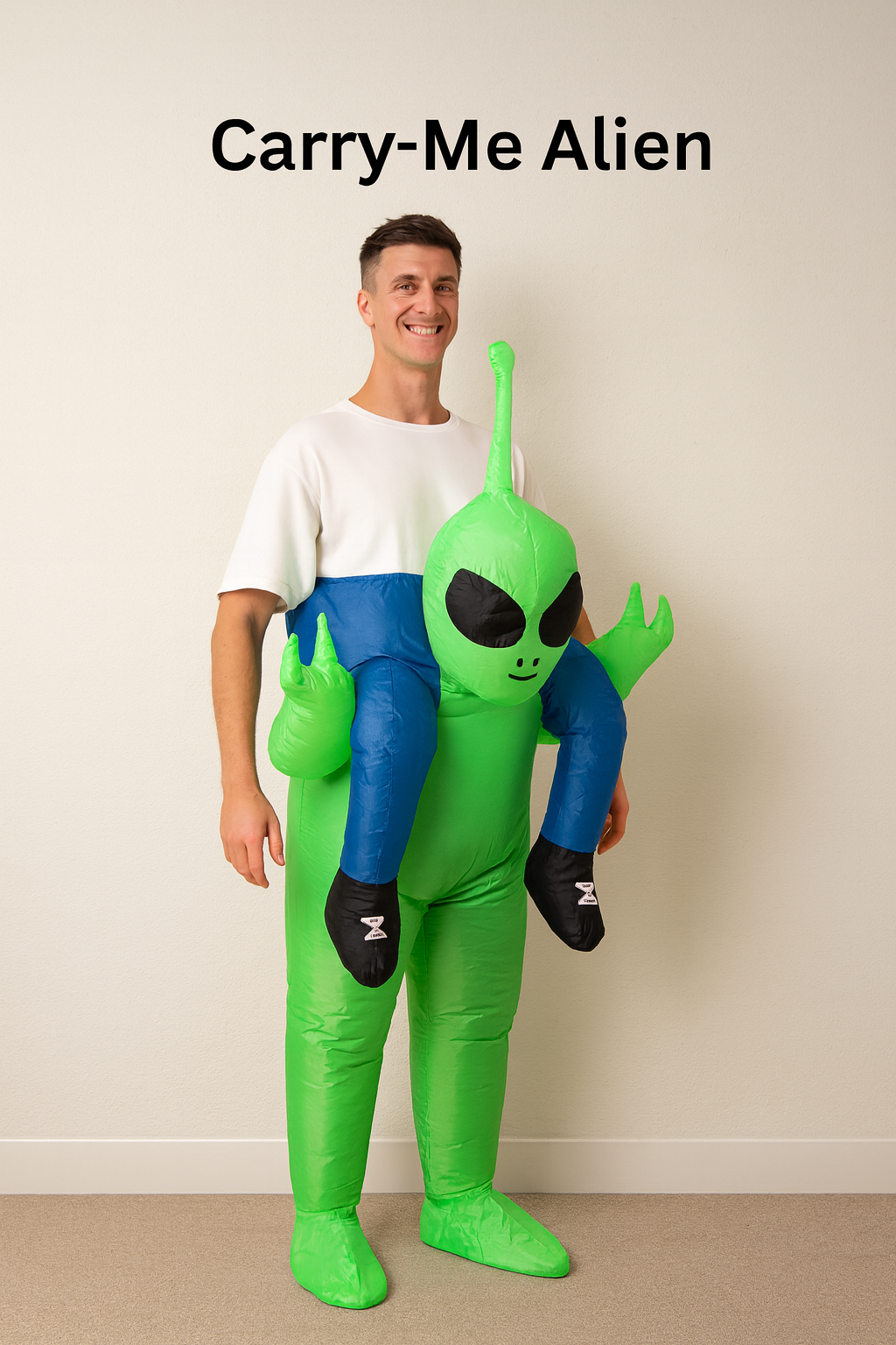 Person wearing a green alien costume with 'Carry-Me Alien' text above.